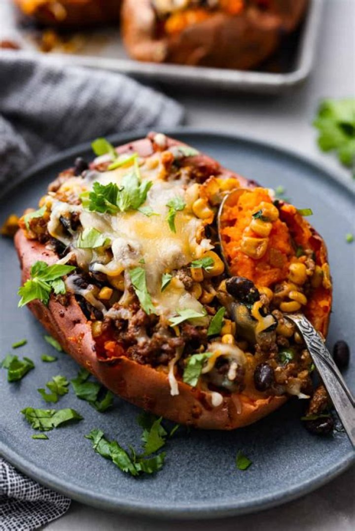 Baked sweet potato stuffed with sloppy joe meat