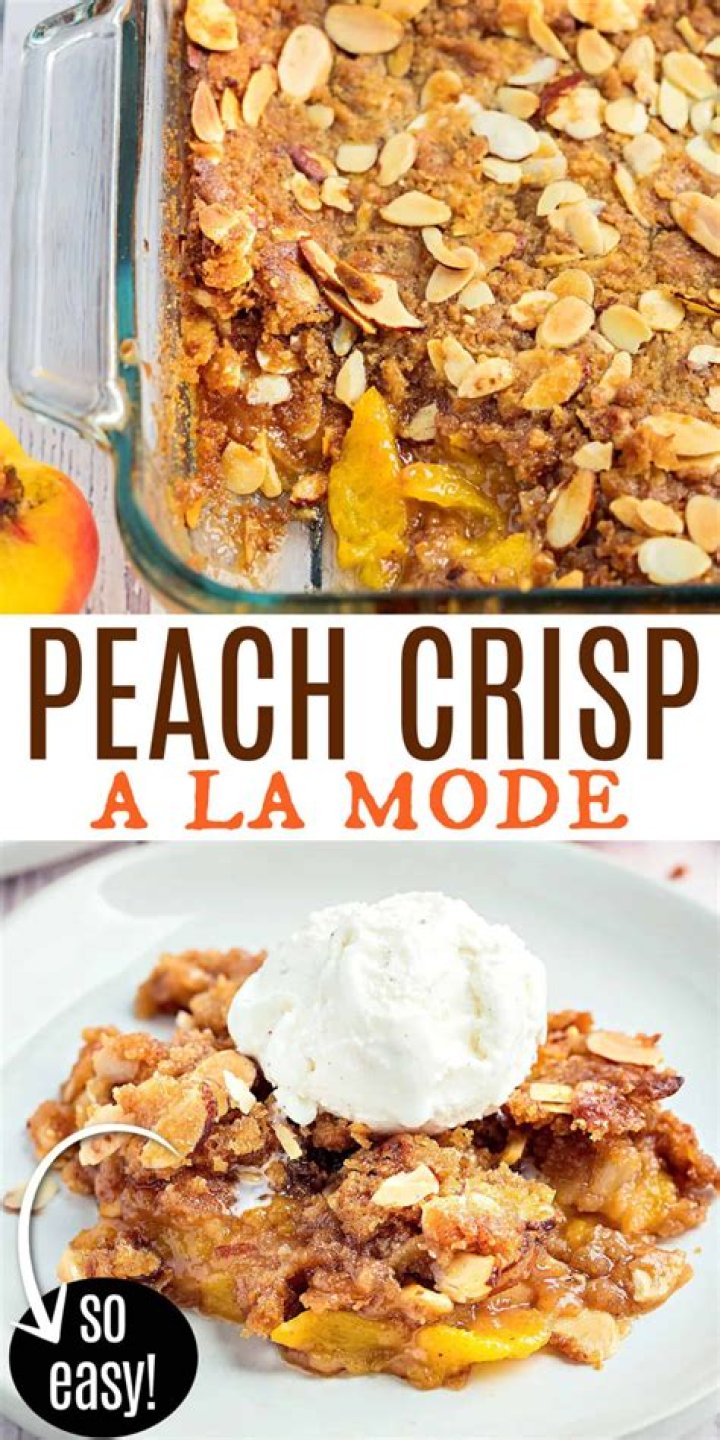 Peach crisp topped with vanilla ice cream in a white bowl.